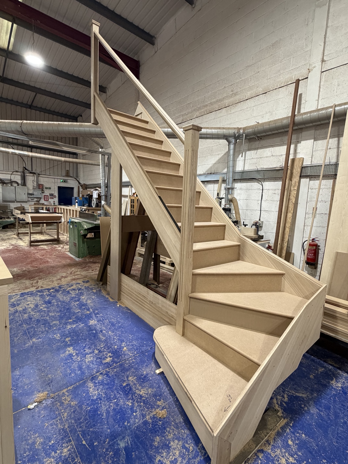 Made-to-measure timber staircase assembled in the Oakley Bespoke workshop