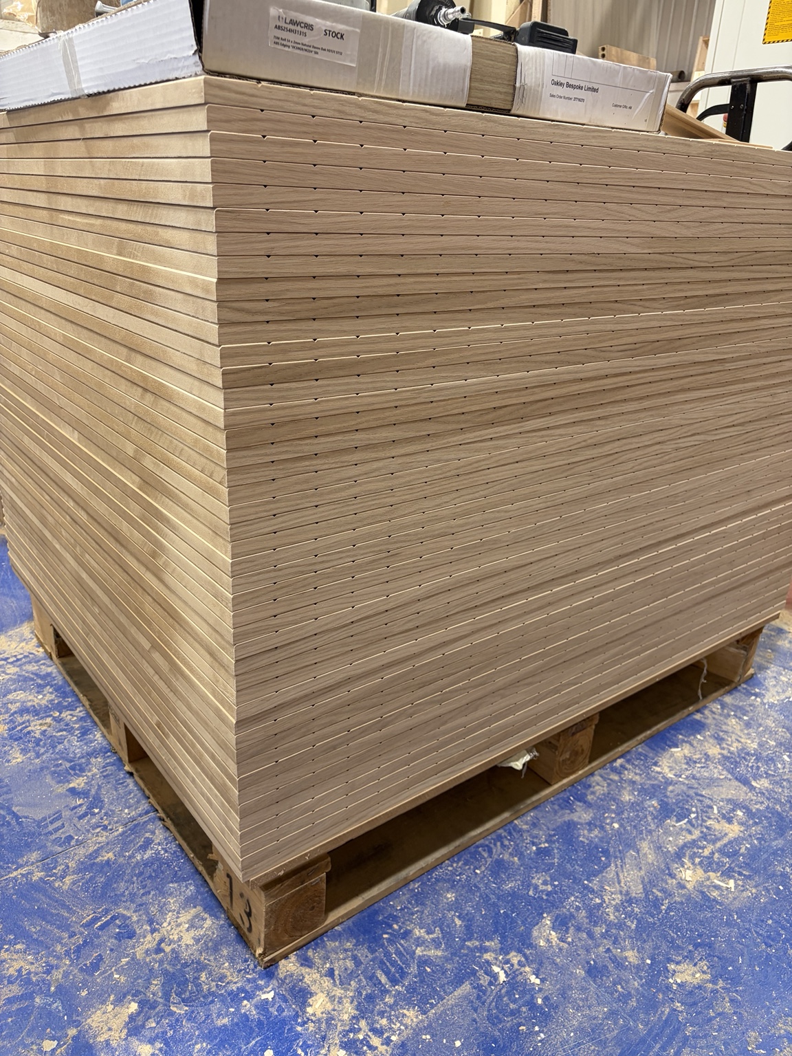 A batch of precision-machined timber components prepared in the workshop